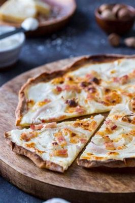  Tarte Flambée:  A Delicate Symphony of Crispy Crust and Creamy fromage blanc!